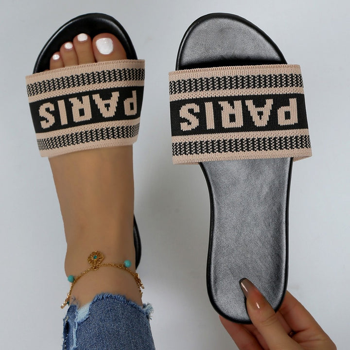 Dame modeslidesandaler med trendy skriftzug Stilla