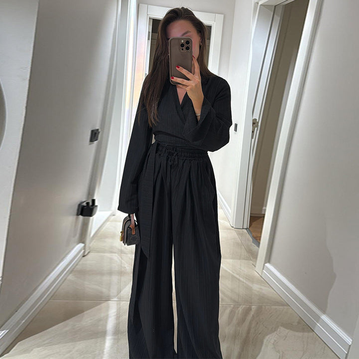 Dame Elegant Jumpsuit med V-hals og bredt ben Stilla