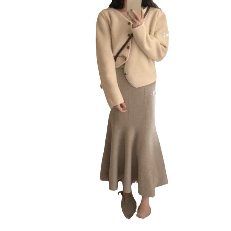 Kvindernes elegante midi-nederdel med svingende kant og høj talje Stilla