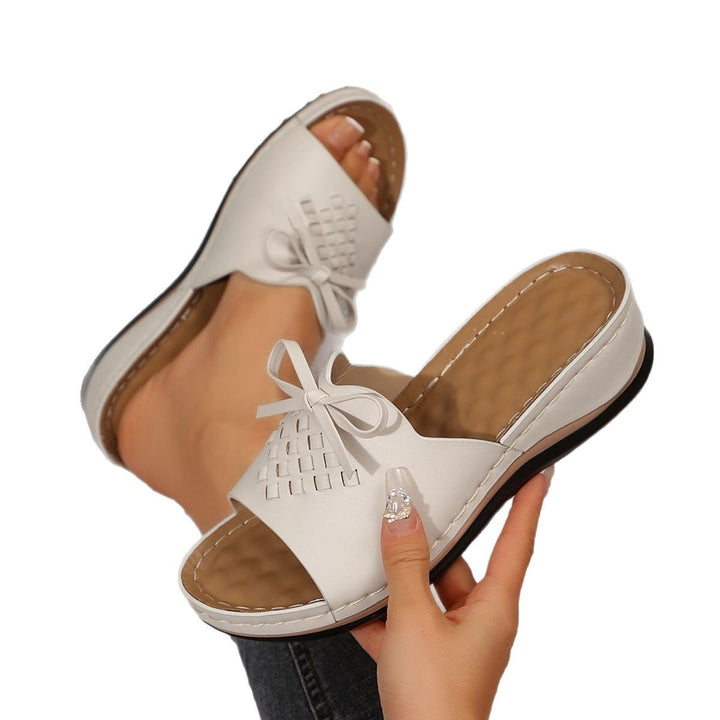 Dame Slide-sandaler med flettet overdel og dekorativt sløjfeaccent Stilla