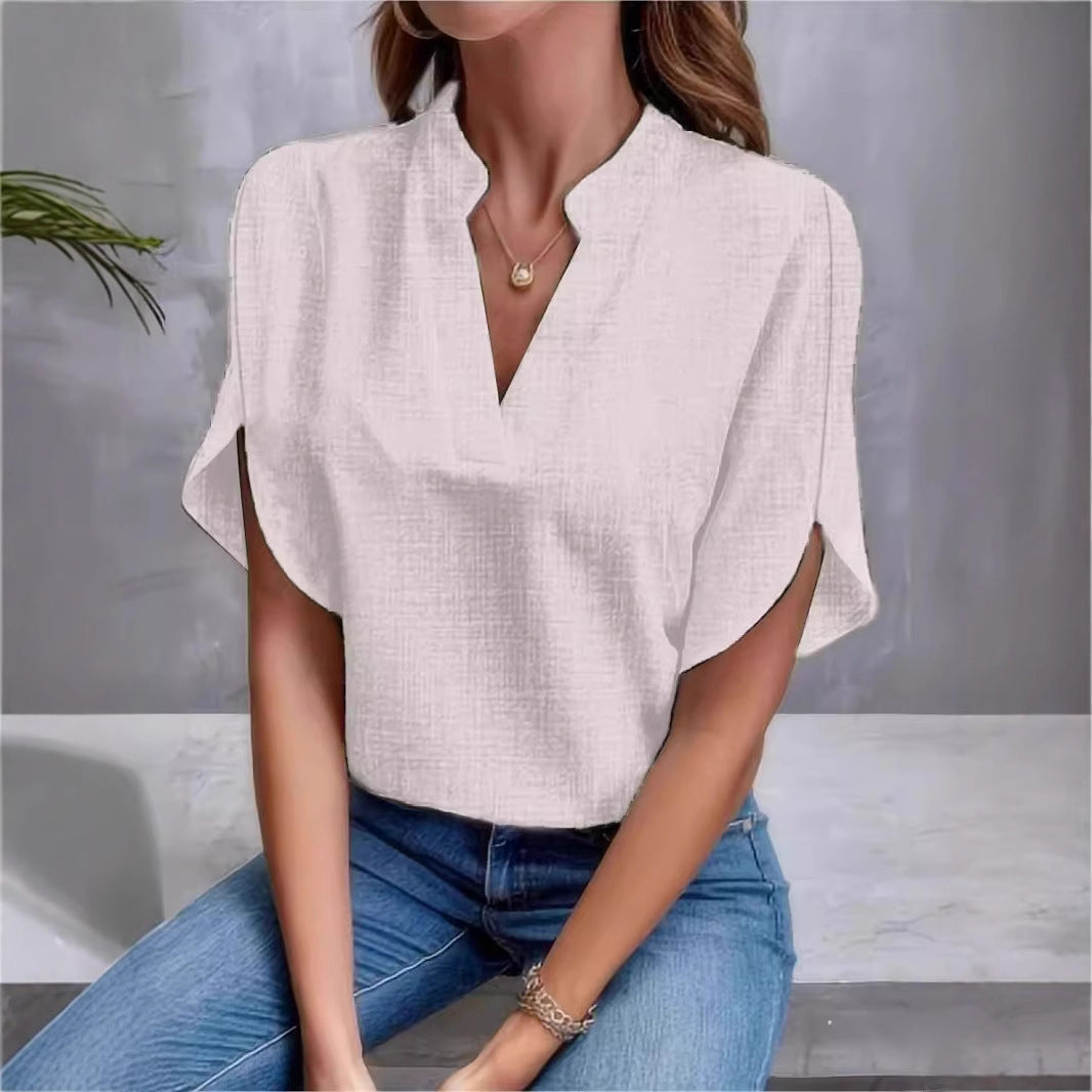 Dame elegant kortærmet bluse med moderne ståkrave og casual sideslidser Stilla