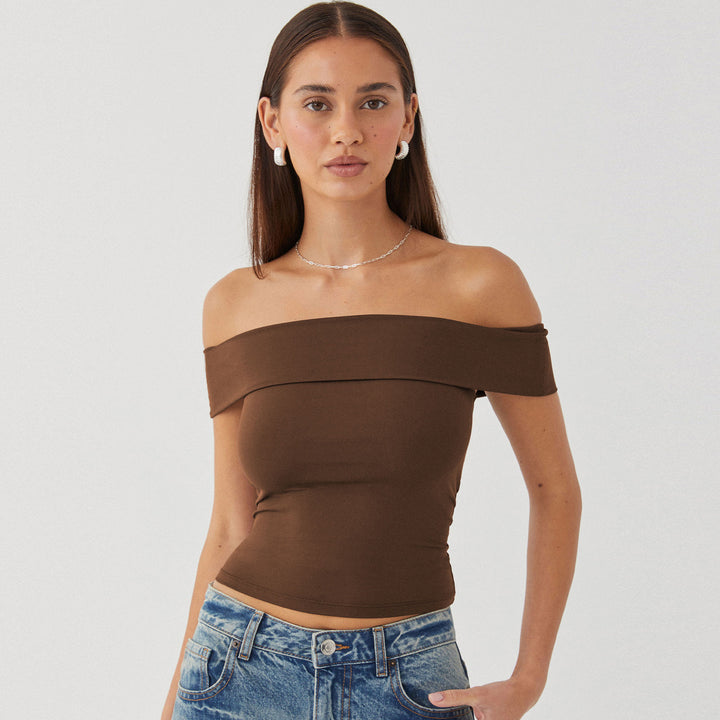 Dame Off-Shoulder Top med tætsiddende snit og elastisk linning Stiila