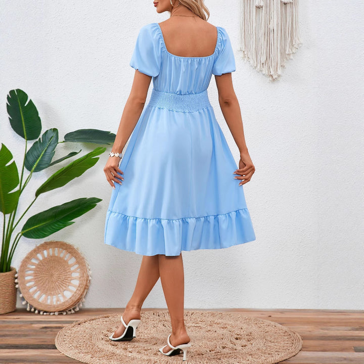 Dame Midikjole med elastisk smocking og legesyg flounce Stilla