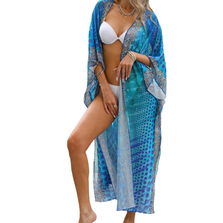 Dame elegant strandkimono med blomsterprint og gennemsigtig struktur Stilla