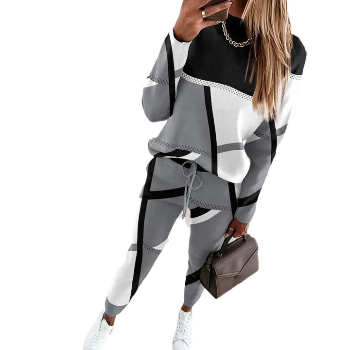 Dame trendy fritidsdragt med geometrisk mønster og praktisk snoretræk Stilla