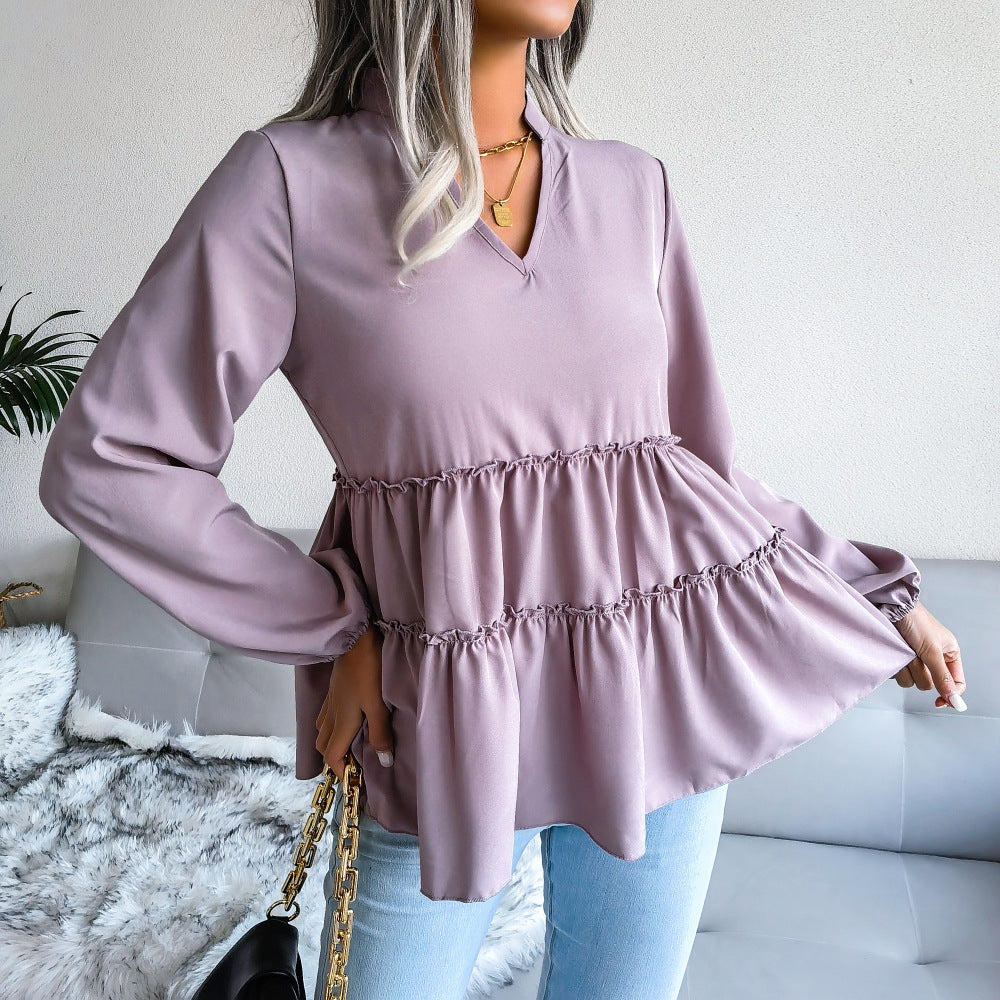 Damebluse med flerfarvet design og voluminøst snit Stilla