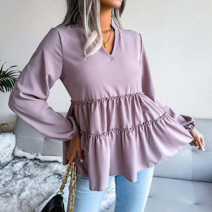 Damebluse med flerfarvet design og voluminøst snit Stilla