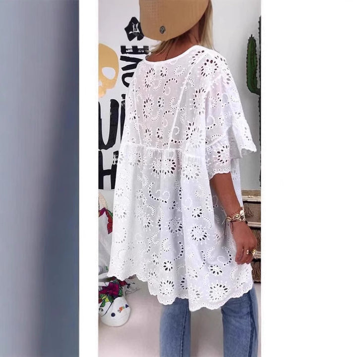 Damebluse med florale broderier og vide ærmer Skovae