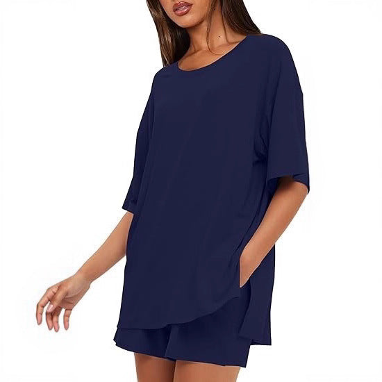Dame Oversize T-shirt med afslappet snit og sidelange sprækker Skovae