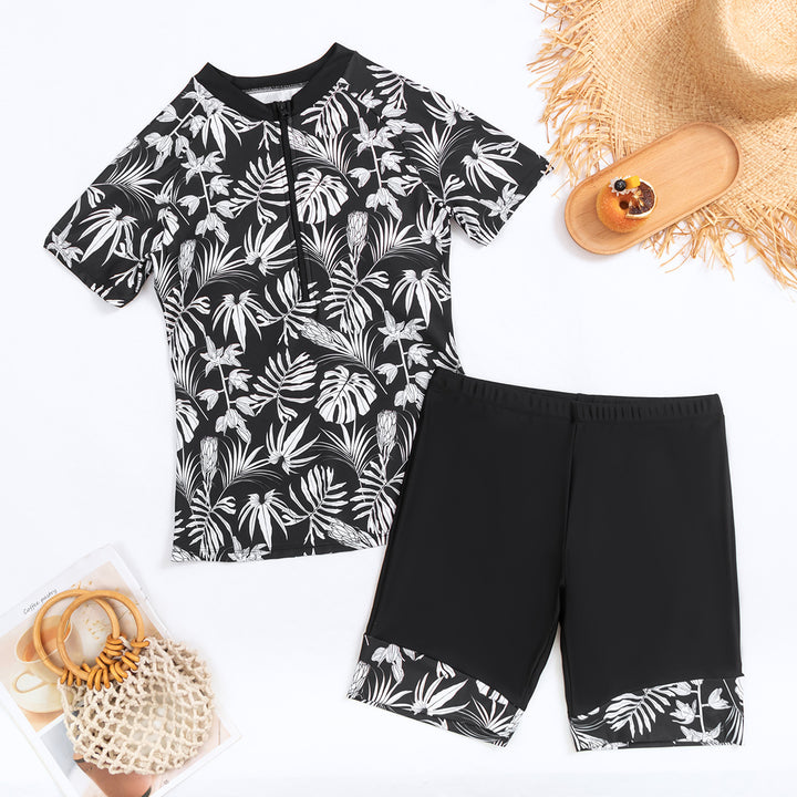 Dame Surfdragt med elegant plante mønster og praktiske shorts Stilla