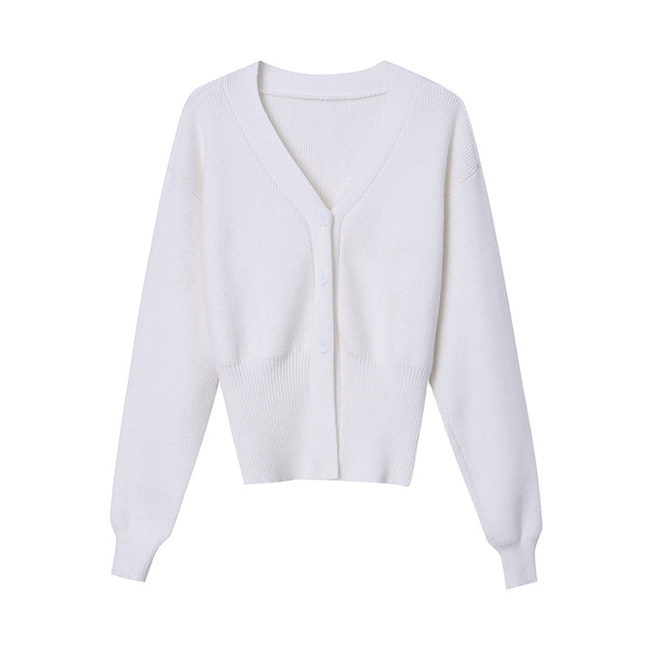 Dame stilfuld cardigan med knapdetaljer og elegant V-hals Stilla
