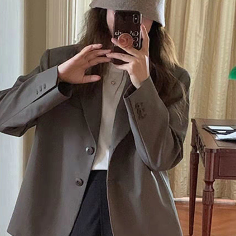 Dameblazer med klassisk snit og elegante knapdetaljer Stilla