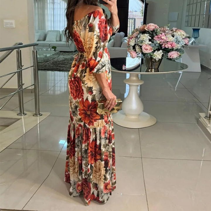 Kvinders blomster maxi kjole med off-shoulder design og flæse kant Stilla