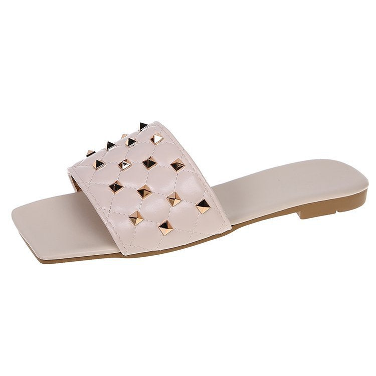 Damer Glamourøse Slide-sandaler med dekorativt nitte-design og komfortabel fodseng Stilla