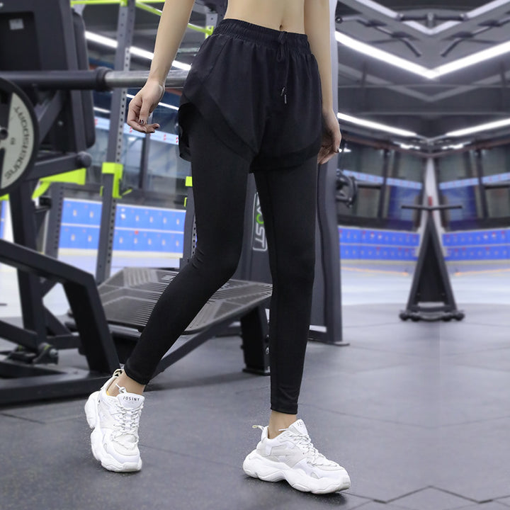 Dame Sporty kompressions leggings med integreret shorts-design og elastisk kant Stilla