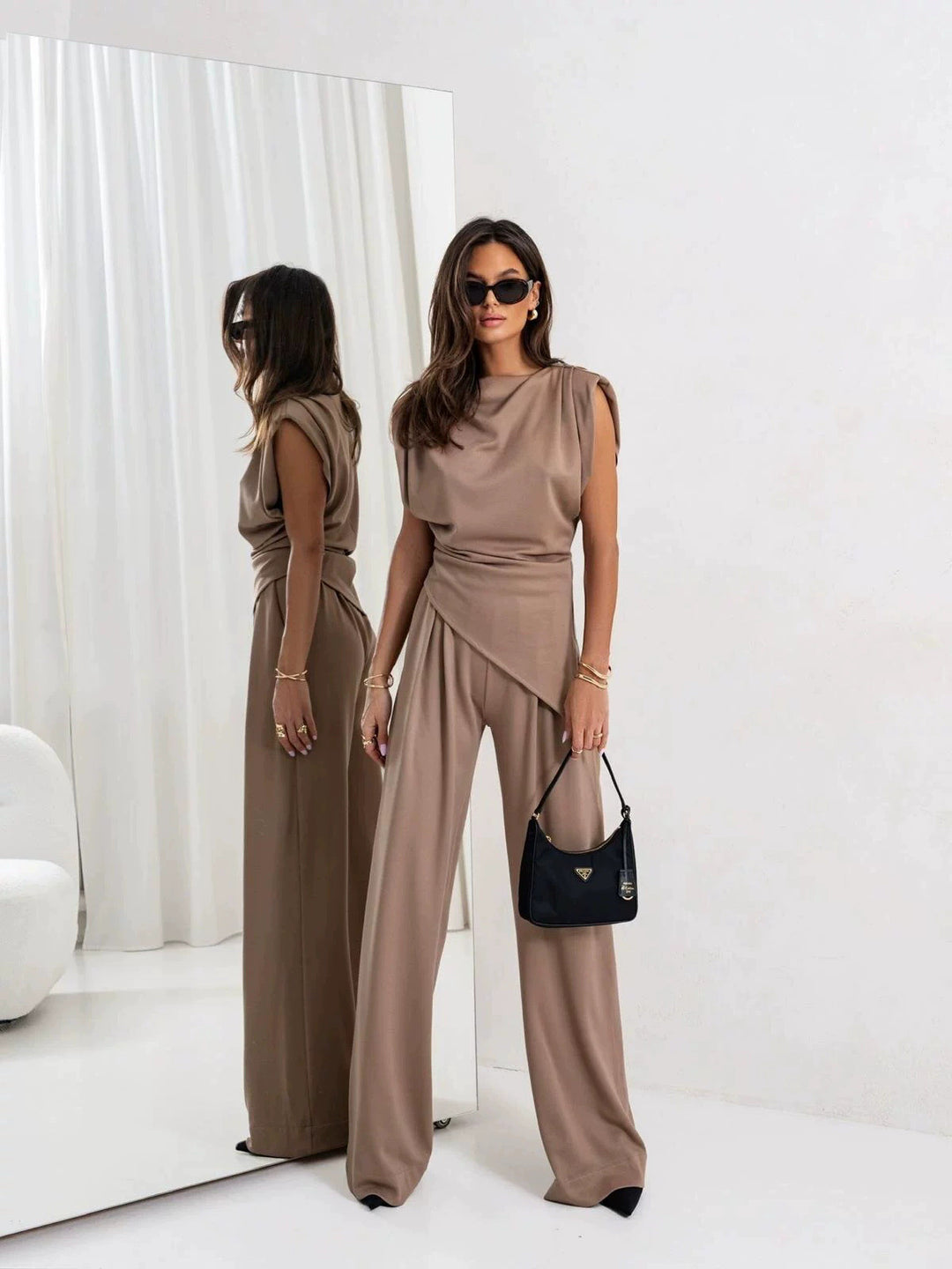 Dame Elegant overall-sæt med asymmetrisk design og brede ben Stilla
