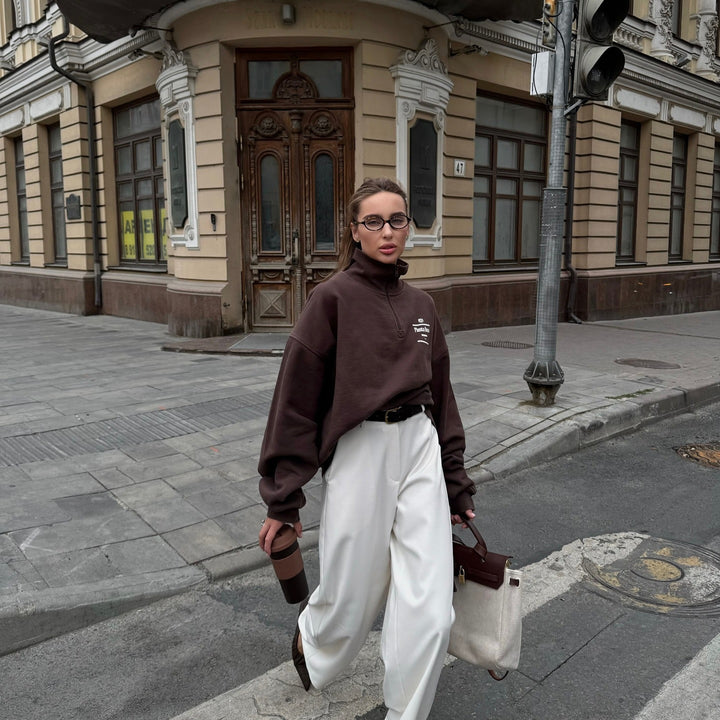 Kvinders streetwear sweater med høj krave og halv lynlås lukning Stilla