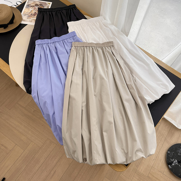 Kvinders elegante midi-nederdel med elastisk talje og voluminøs skæring Stilla