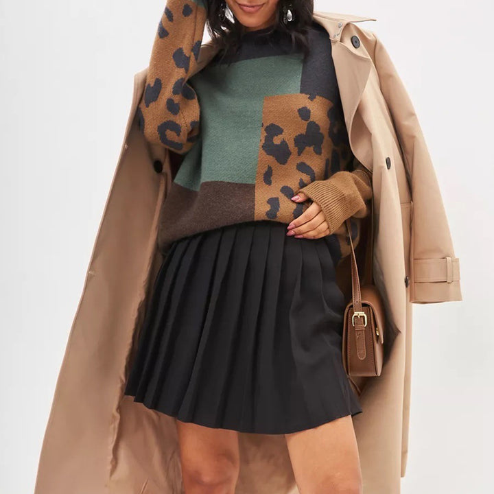 Kvinders chunky strikket sweater med moderne leoparddesign og farvede blokkelementer Stilla