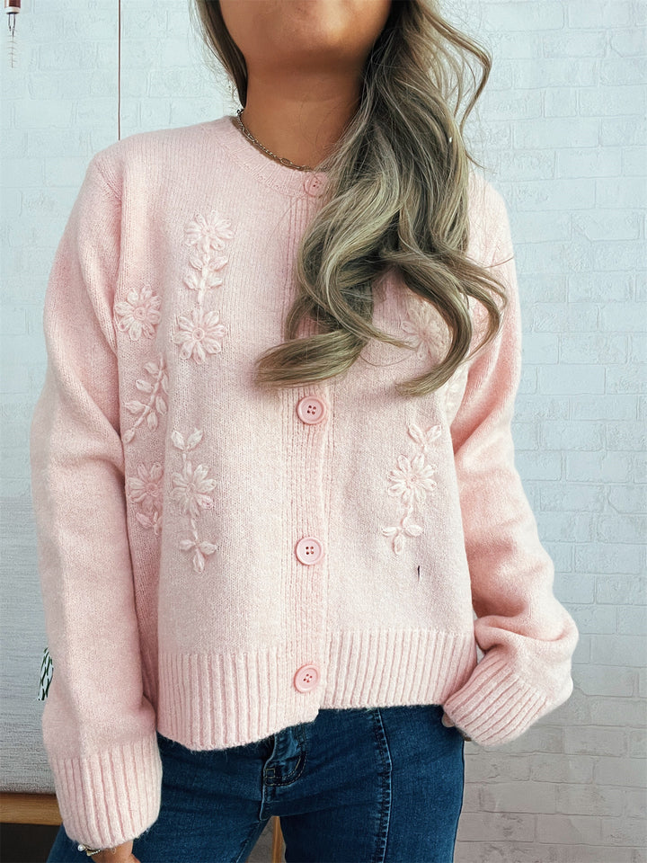 Kvinders løstsiddende strik cardigan med blomsterapplikationer og knapdetaljer Stilla
