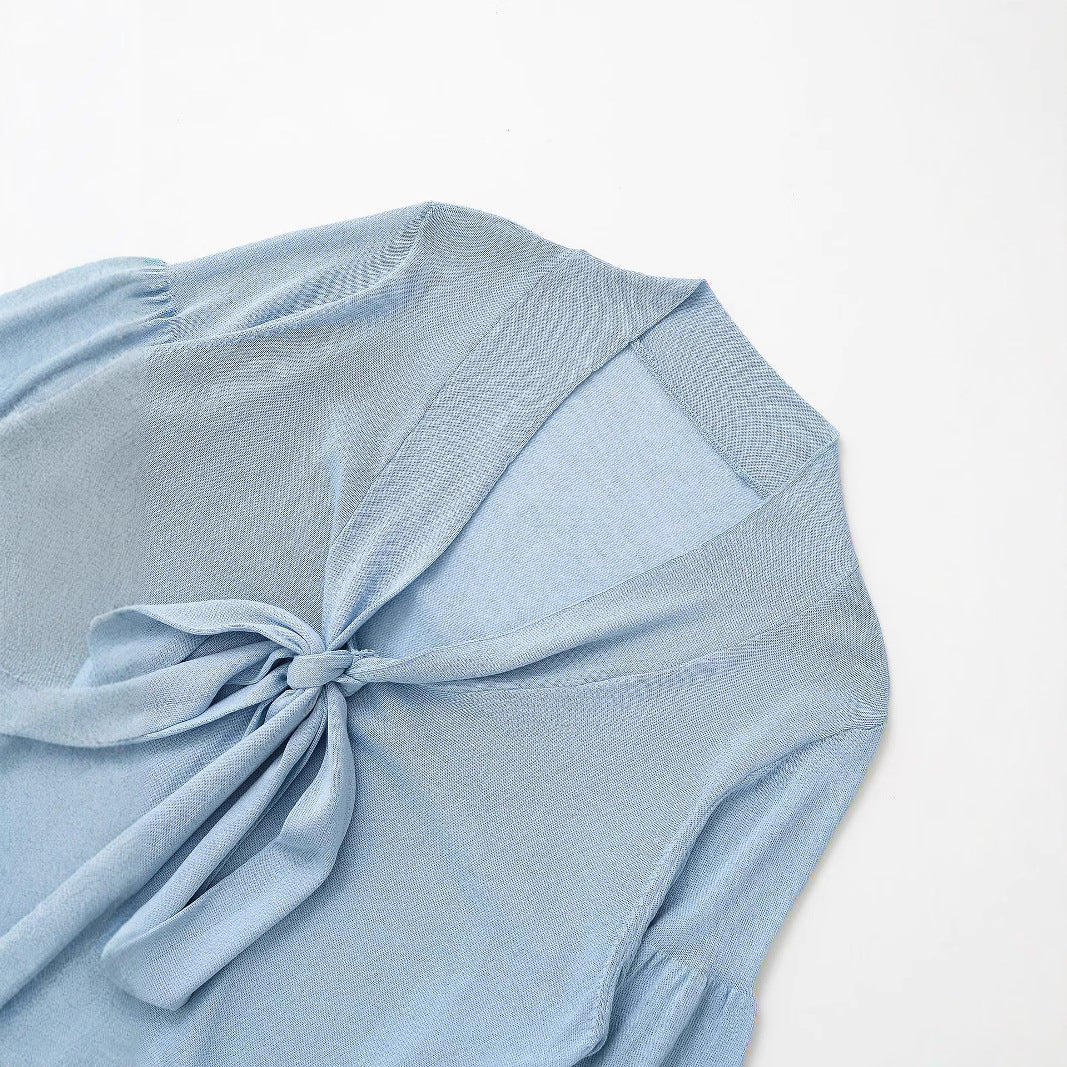 Kvinders luftbluse med romantiske ruffle-detaljer og bindebånd Stilla