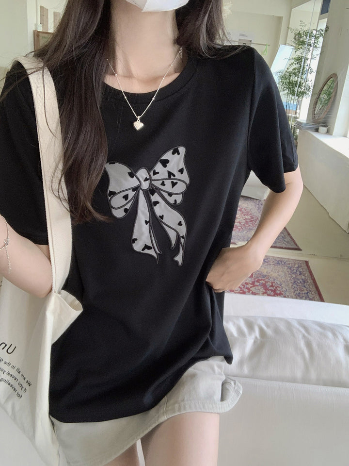 Femme Legende Sløjfe Grafik T-Shirt Stilla