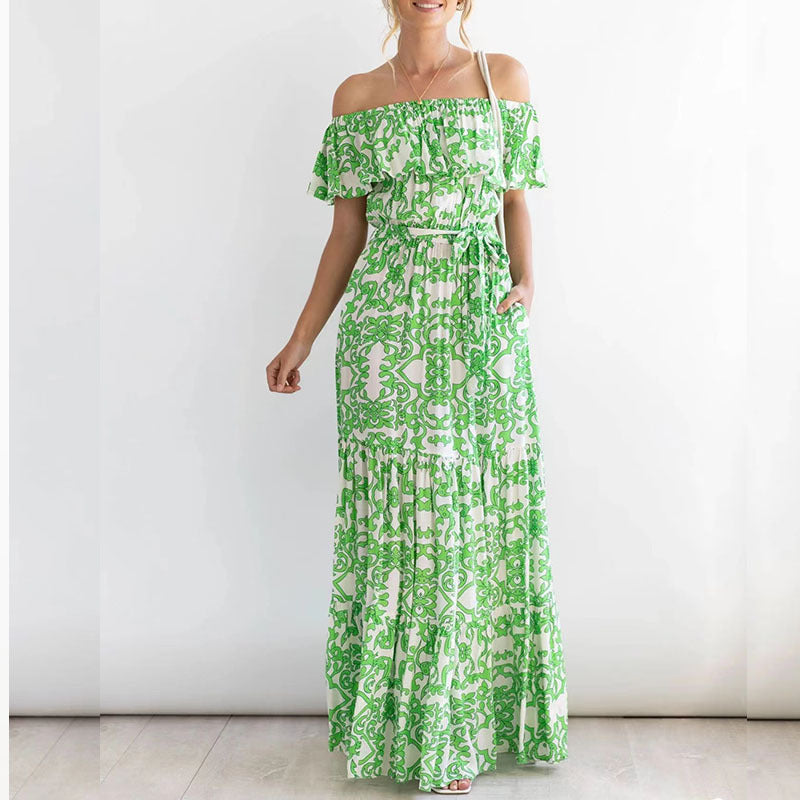Dame maxikjole med off-shoulder design og blomster mønster detaljer Stilla