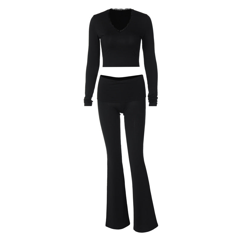 Dame sæt bestående af tætsiddende langærmet top og elegante bootcut bukser Stilla