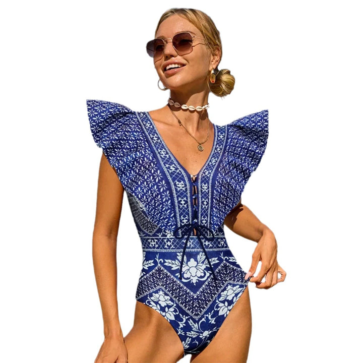 Damer ét-stykke badedragt med voluminøse flæse detaljer og dyb V-udskæring Stilla