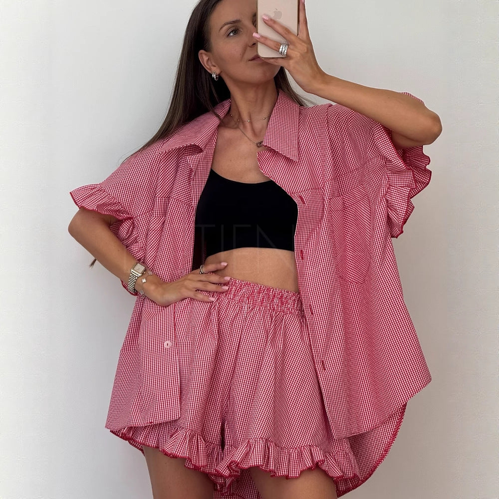 Dame Mode Sæt bestående af stribet kort bluse og flæse shorts Stilla