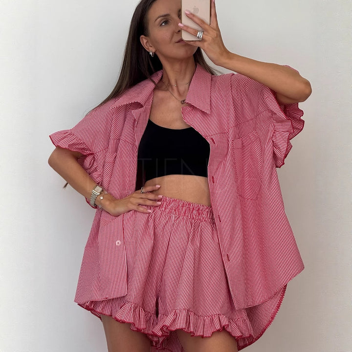 Dame Mode Sæt bestående af stribet kort bluse og flæse shorts Stilla