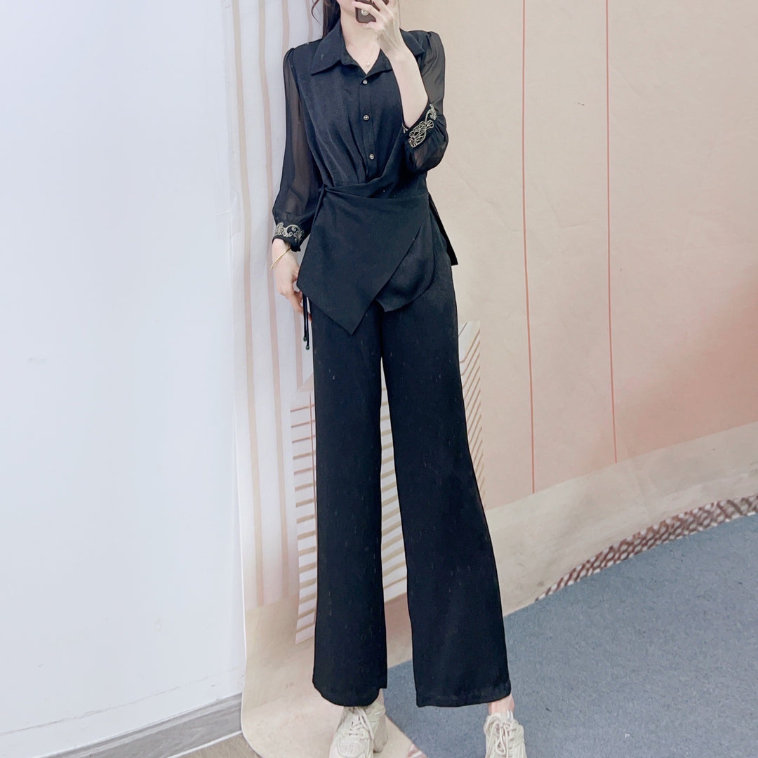 Dame Elegant og behagelig bluse med vide bukser Stilla