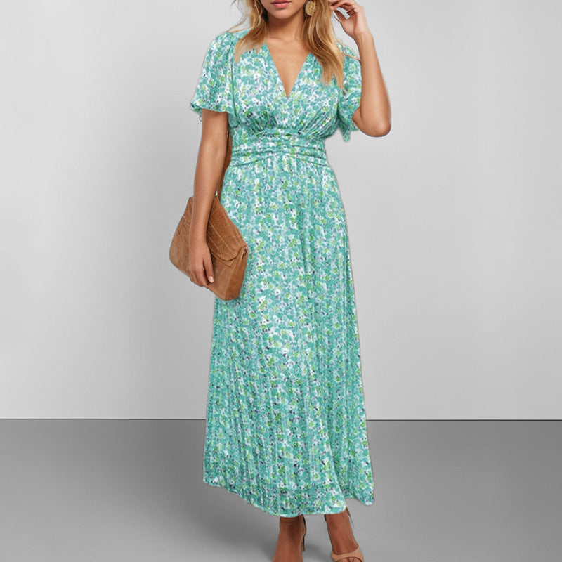 Kvindernes Flydende Maxi Kjole med Blomsterdesign og V-Hals Stilla