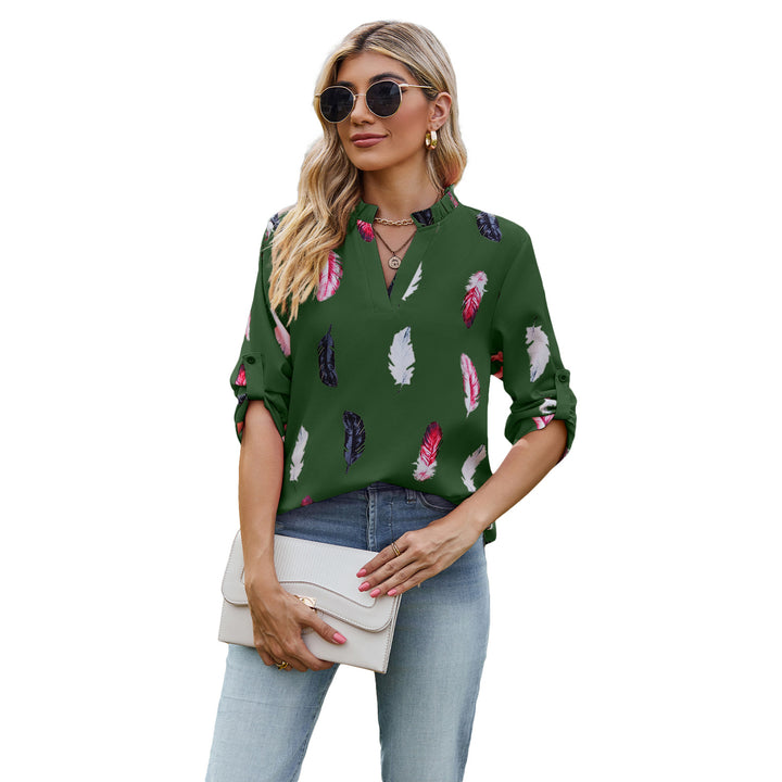 Damebluse med elegant fjerdesign og halvlange ærmer Stilla