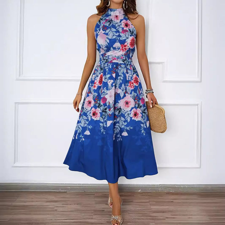 Dame Midi-Kjole med blomsterdesign og elegant Halterneck Stilla