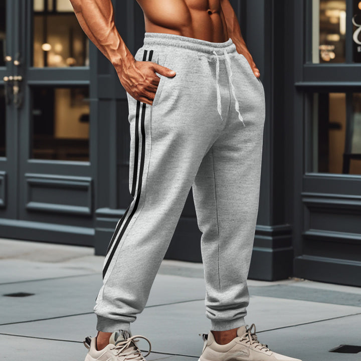 Herre Sporty Joggingbukser med elastisk talje og stilfulde side striber Stilla