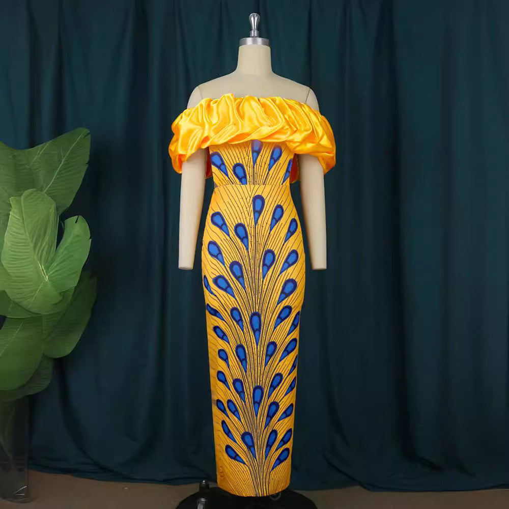 Dame Elegant aftenkjole med skulderfri design og voluminiøs flæsekant Skovae