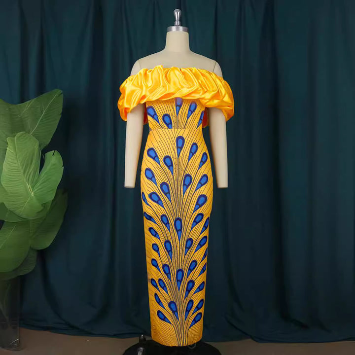 Dame Elegant aftenkjole med skulderfri design og voluminiøs flæsekant Skovae