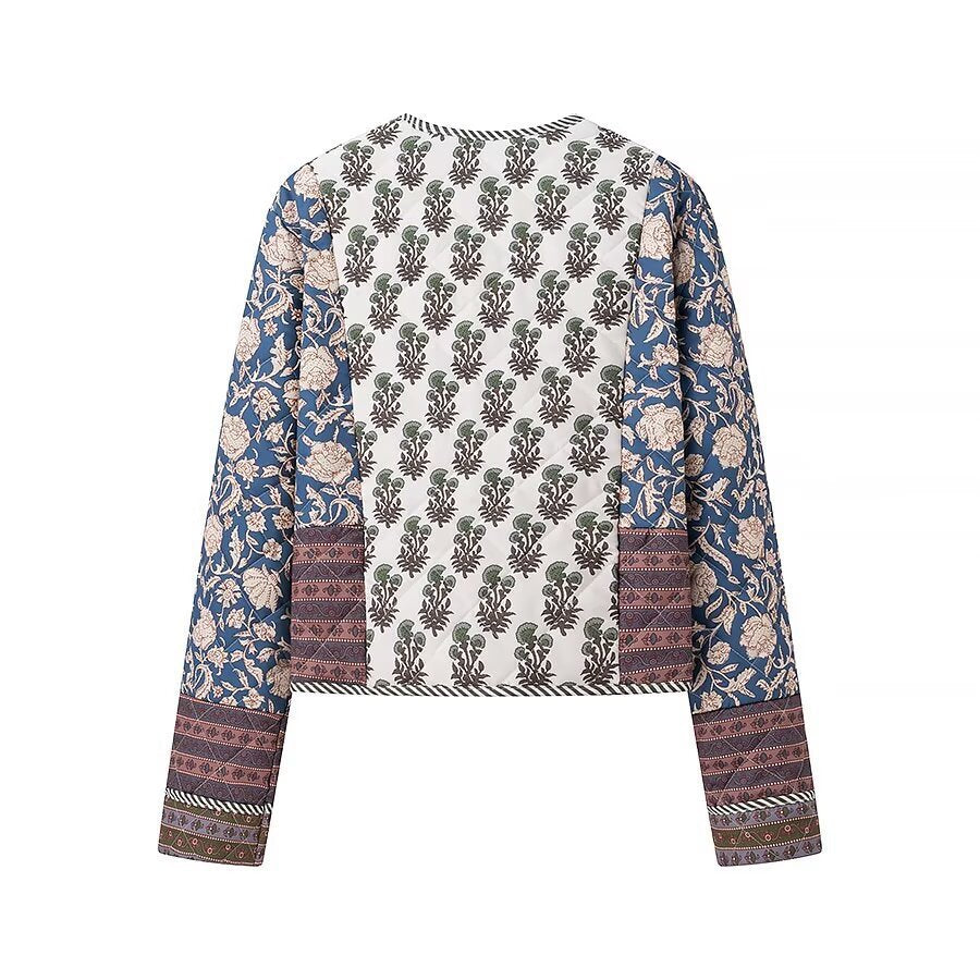 Dame patchwork-jakke med blomstrede mønstre og elegante detaljer Stilla