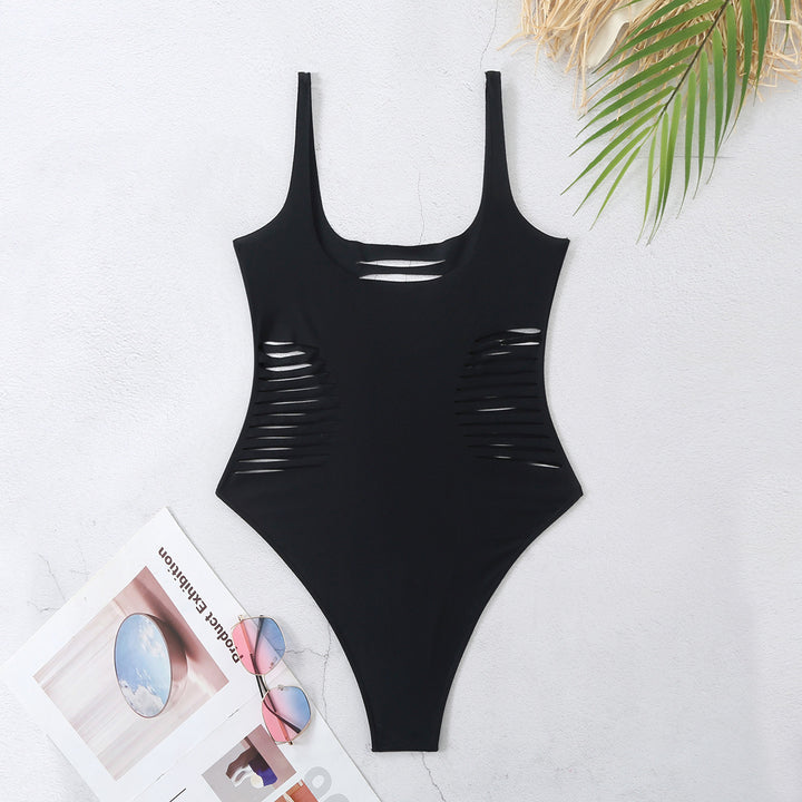 Dame én-delt badedragt med raffinerede cut-out-detaljer Stilla