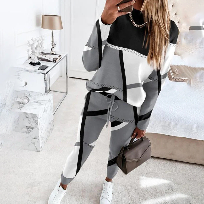 Dame trendy fritidsdragt med geometrisk mønster og praktisk snoretræk Stilla