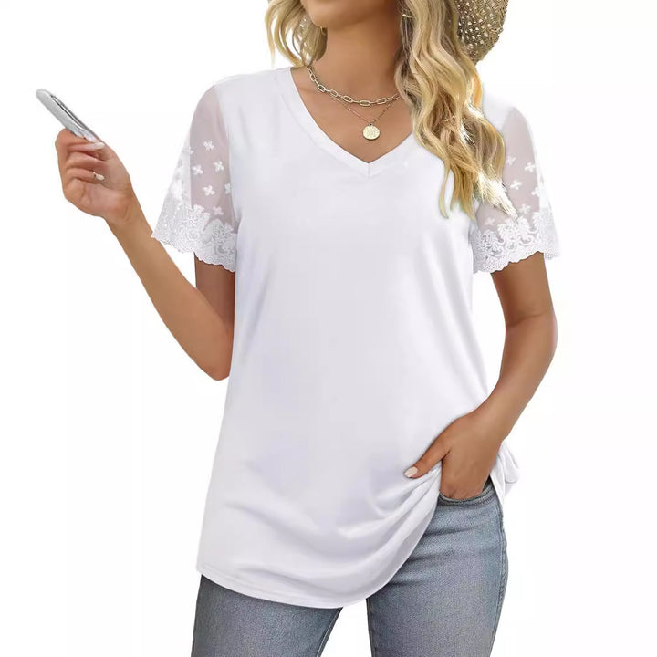 Damebluse med elegante spidsærmer og V-udskæring Skovae