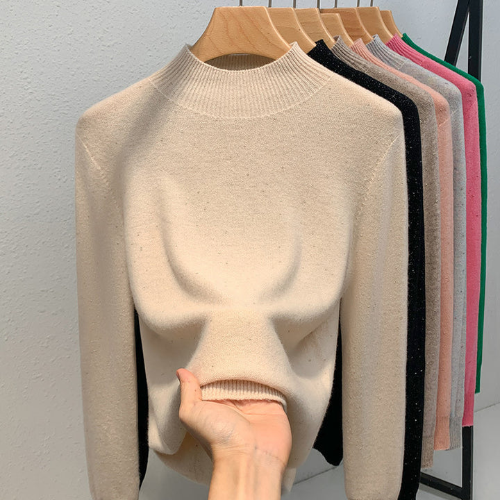 Dame strikpullover med fin glimmergarnstruktur og moderne ståkrave Stilla