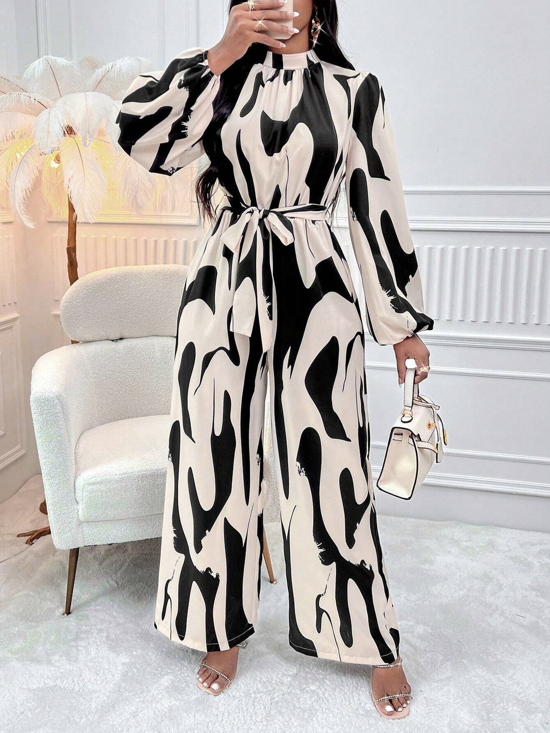 Dame Langærmet-Abstract-Print-Jumpsuit med Taljesnor Stilla