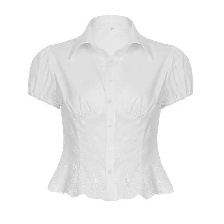 Damebluse med elegant spidsudsmykning og puffærmer Skovae