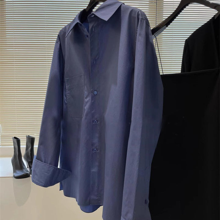 Kvinders elegante langærmede bluse med knaplukning og brystlomme Stilla