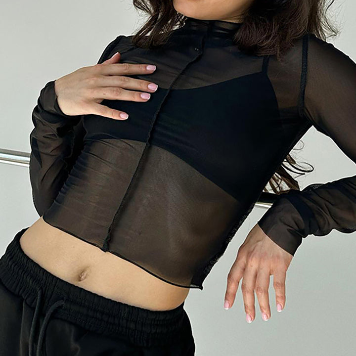 Dame Gennemsigtig Bluse med voluminøse ærmer og elegante knapdetaljer Stilla