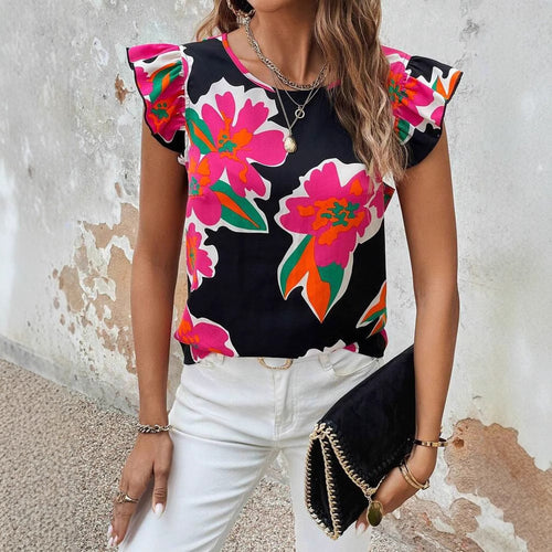Dame blusenshirt med florale puffærmer og moderne snit Stilla