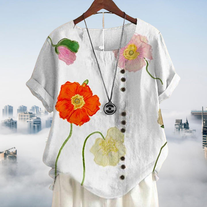 Dame kortærmet bluse med floral motiv og knapdetalje Stilla