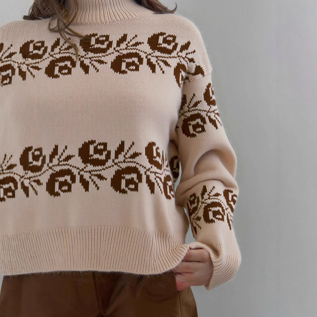 Kvinders strikket sweater med blomsteret jacquardmønster og høj krave Stilla